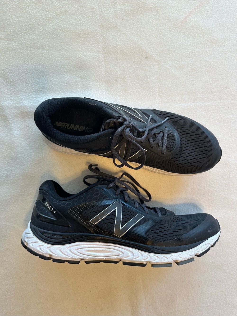 Size 14 New Balance Men’s Black and White Athletic Running Shoes